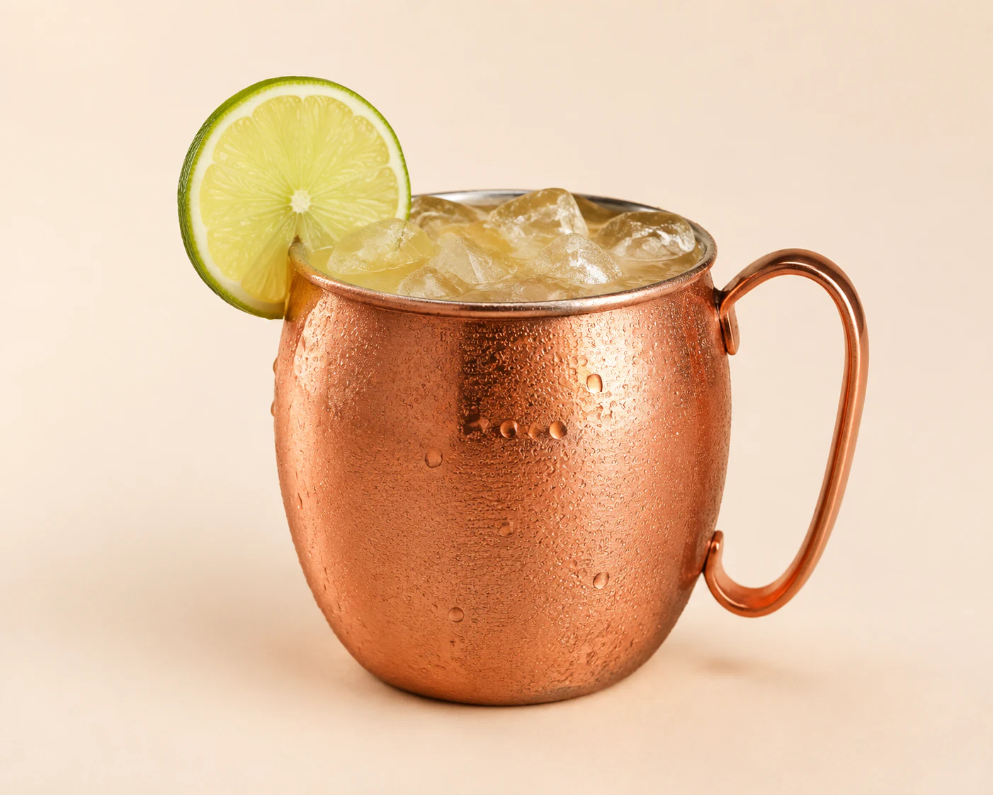 Moscow Mule in a copper mug with ice and a lime wedge
