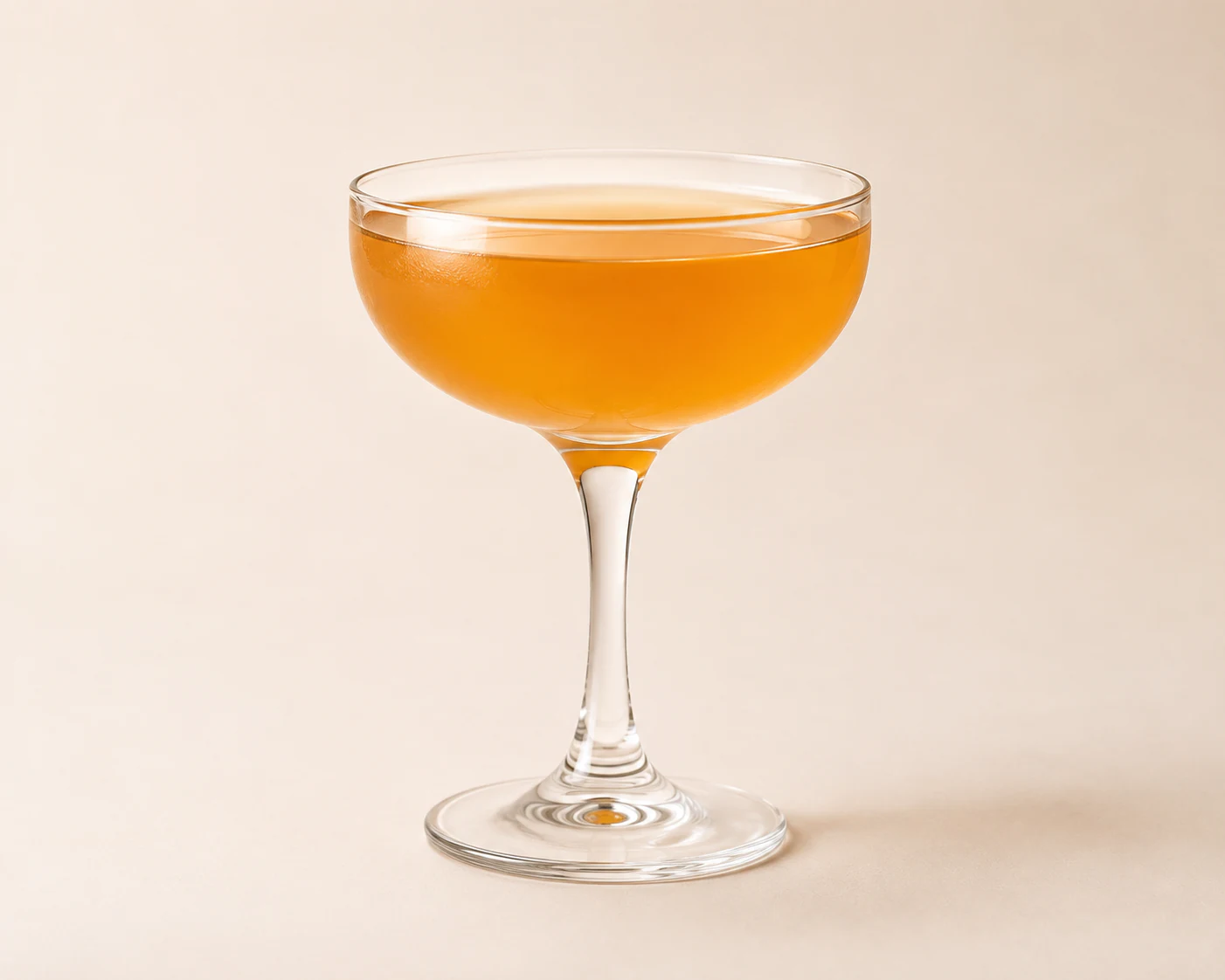 Sidecar cocktail in a coupe with a sugared rim